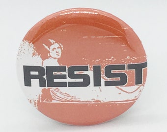 Resist - 1 1/4" Pin, Zipper Pull, Keychain or Magnet