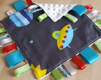Sensory blanket. Comfort blanket with ribbon tags.