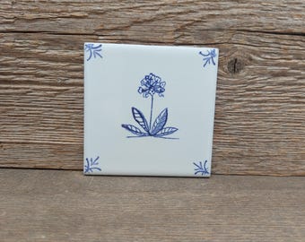 Hand-Painted ceramic Delft Style Spring Flower Tile sample.