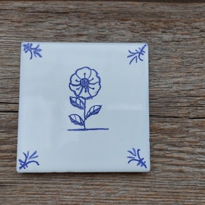 Hand painted Delft style blue ceramic tile with wild flower design. Dutch blue. Backsplash tile. Kitchen, bathroom decor, wall art Marigold