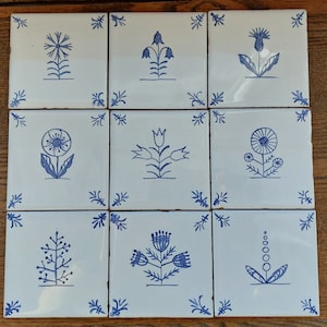 Delft style blue Hand painted ceramic tiles with wild flower design. Dutch blue. Backsplash tile. Kitchen, bathroom decor, fire place decor