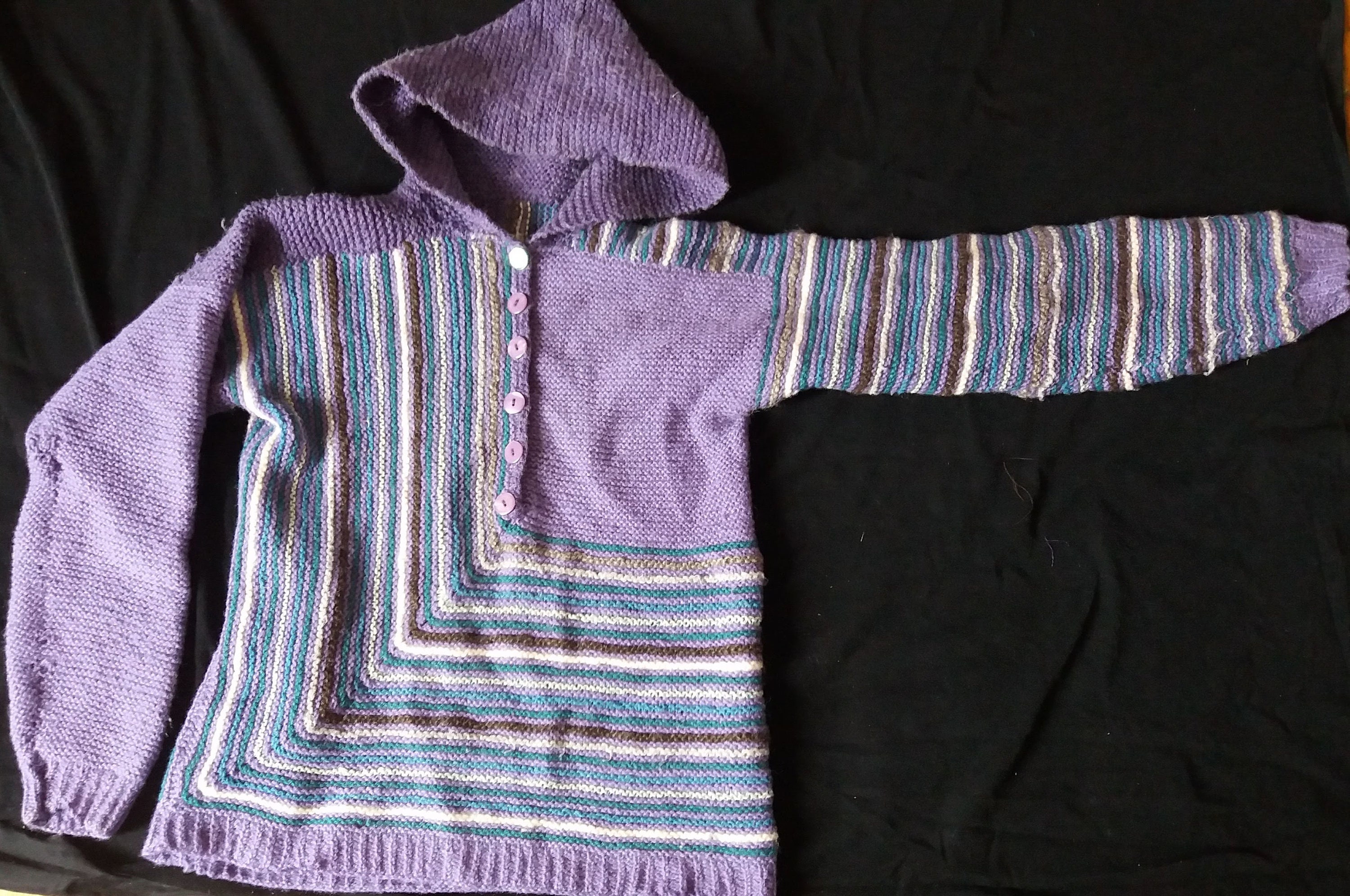 purple and yellow sweater