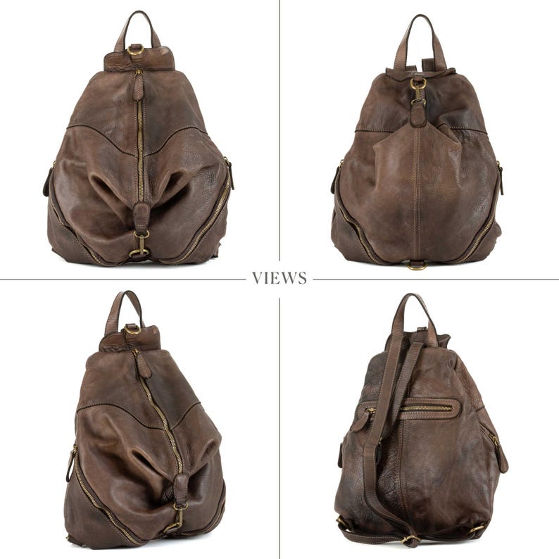 May include: A dark brown leather backpack featuring a teardrop shape, a central vertical zip, and side zip compartments. The bag includes a top handle, adjustable shoulder straps, and antique brass-toned metal hardware throughout the design.