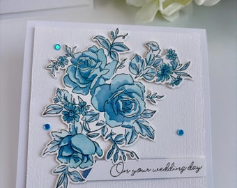 Elegant Blue Rose Cluster Wedding Card | Optional Religious Sentiment