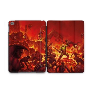 May include: A red and orange iPad case with a graphic of a video game character in a fiery landscape.
