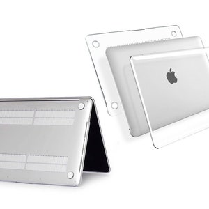 May include: A clear plastic case for a laptop computer. The case is shown in two pieces, one for the top and one for the bottom. The case is designed to protect the laptop from scratches and bumps.