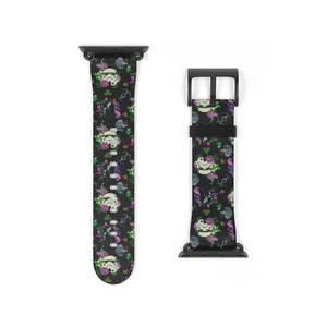 May include: Black Apple Watch band with a floral pattern featuring white Stormtrooper helmets and pink flowers.