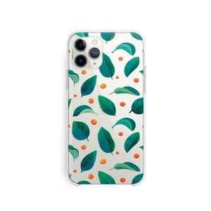May include: Clear phone case with a pattern of green leaves and orange dots.