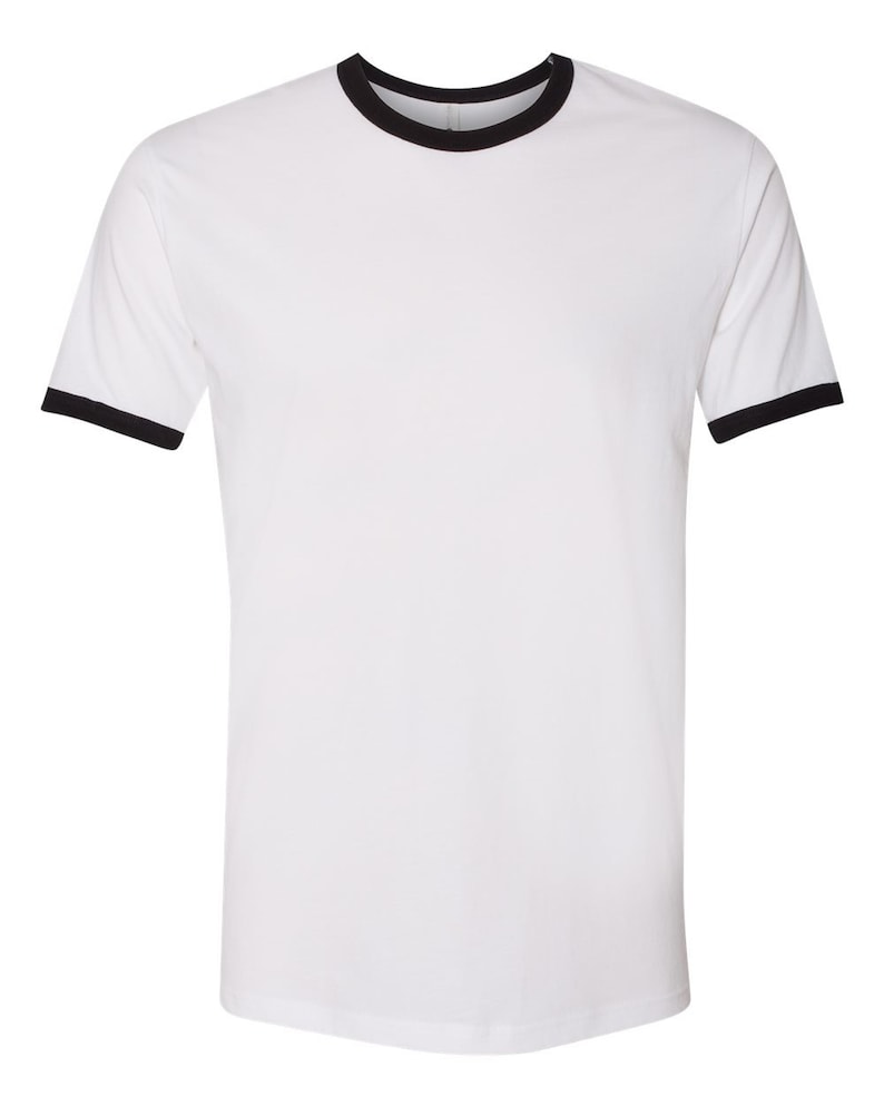 May include: White t-shirt with a black ringer neck and black trim on the sleeves.