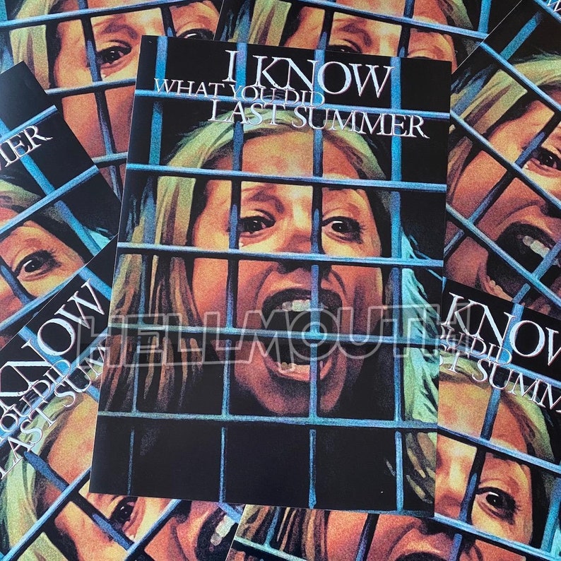 May include: A black and blue poster with a woman's face behind bars. The text on the poster reads "I KNOW WHAT YOU DID LAST SUMMER".