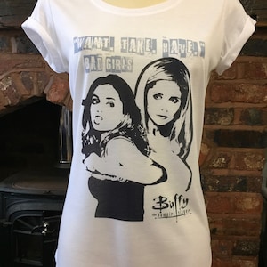 Buffy the Vampire Slayer - White T-Shirt - Buffy and Faith. Men's & Women's all sizes!