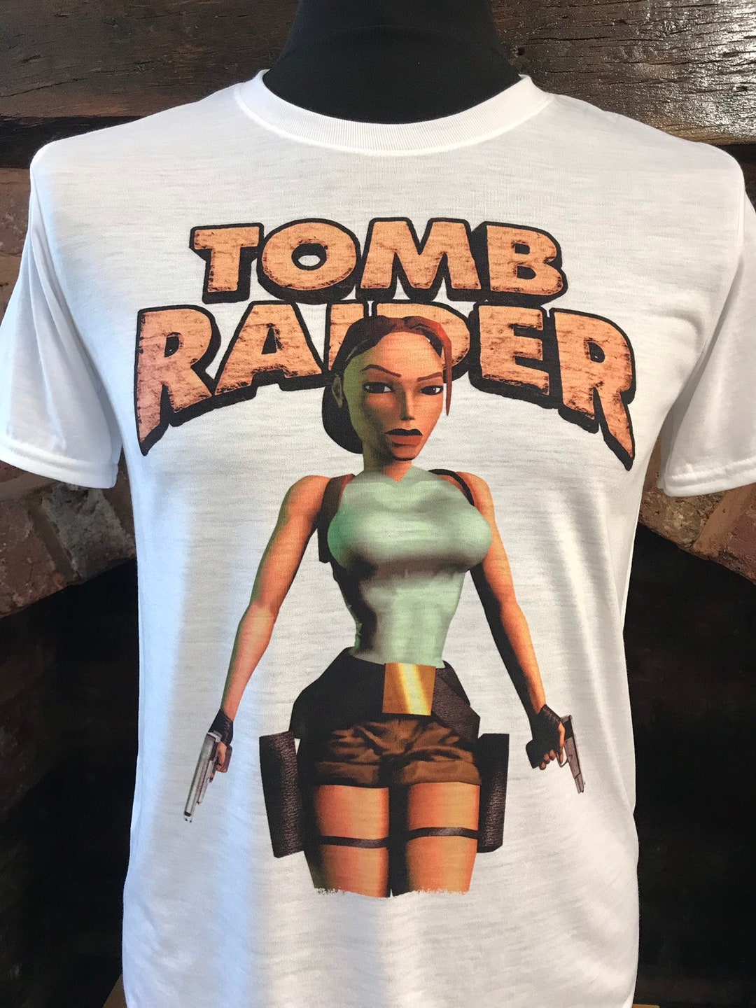 Tomb Raider - Lara Croft - White T-shirt. 90's. Retro Gaming Tomb Raider - Lara Croft - White T-shirt. 90's. Retro Gaming