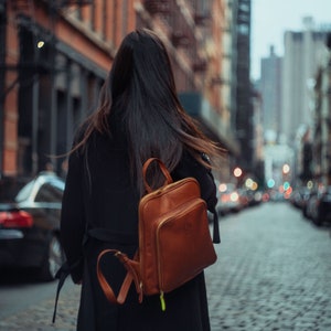 Leather Backpack for Women. Available in Black, Brown and Cognac. This slim bag is made of lightweight real leather. Genuine Natural leather image 2
