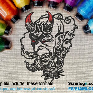 May include: Embroidered design of a red devil with horns, a beard, and a chain around its neck. The design is on a beige fabric background.