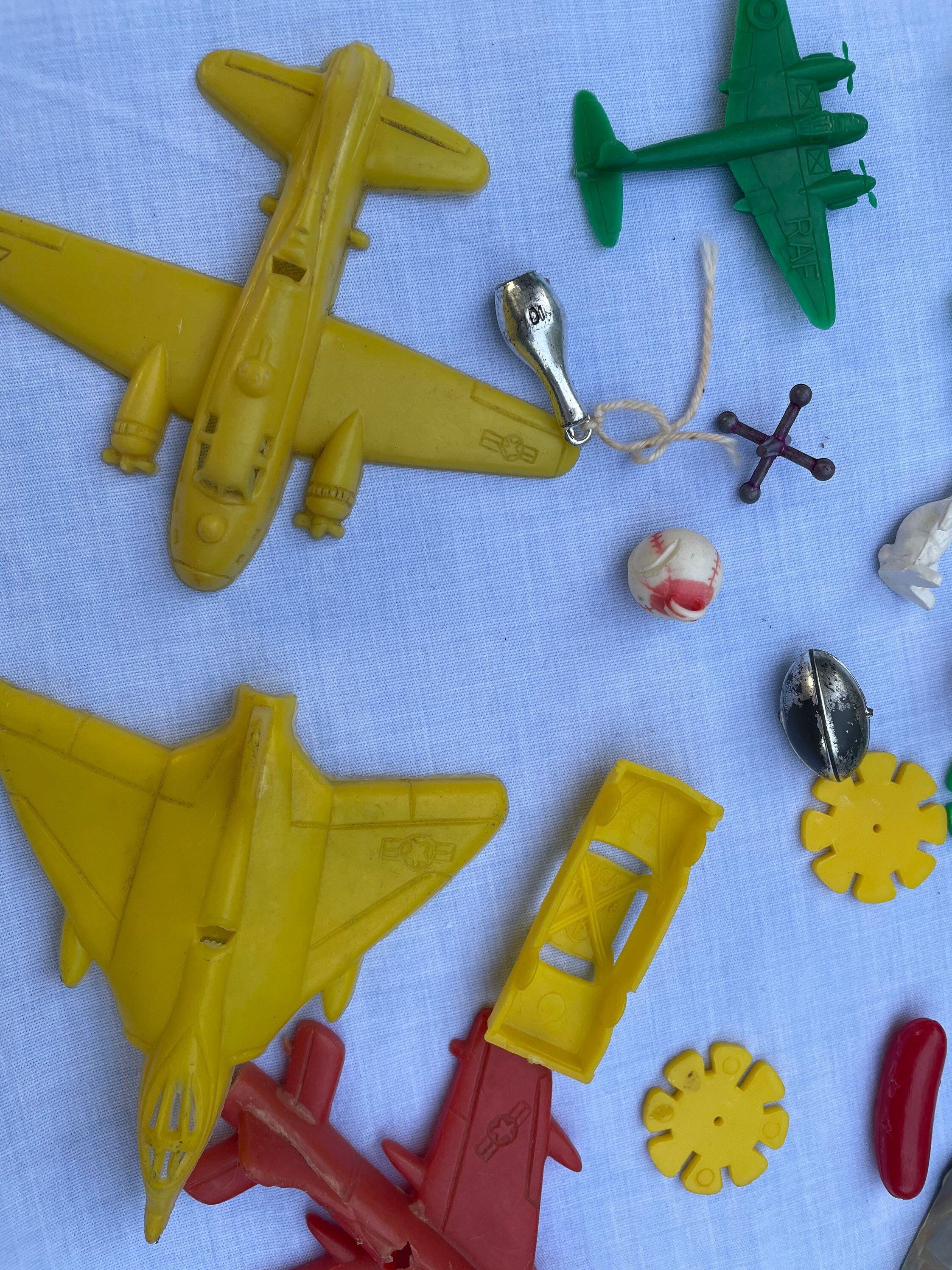 A Bunch of plastic old small toys. planes sports animals and Etsy