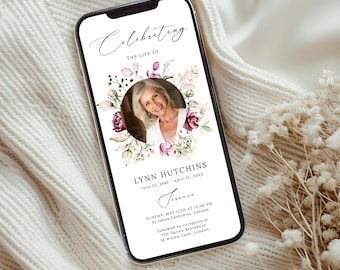 May include: A smartphone displays a memorial invitation with the text "Celebrating the Life of Lynn Hutchins." The design includes a photo of a woman surrounded by floral accents in shades of pink and purple.