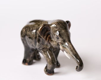 Hand-Painted Ceramic Elephant Figurine: Collectable Pottery Art