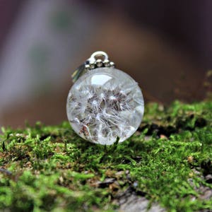 Pendant with a dandelion , encased in a crystal clear resin Tiny dandelion