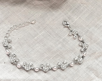 Pulsera Mickey de perla blanca ajustable en oro o plata