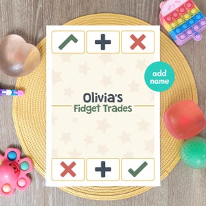 May include: A rectangular sign with a cream background featuring a light star pattern and the text Olivia's Fidget Trades. The sign includes a top row with a green check, a dark grey plus, and a red x, and a bottom row with a red x, a dark grey plus, and a green check. A teal circle with the text add name is present.