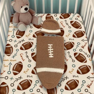 Newborn crochet football cocoon