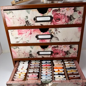 Beautiful wood embroidery floss organizer cabinet holds up to 300 bobbins full of floss