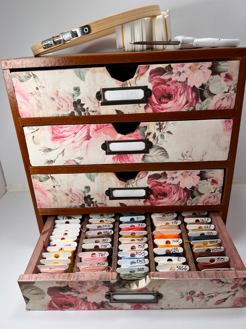 Beautiful wood embroidery floss organizer cabinet holds up to 300 bobbins full of floss