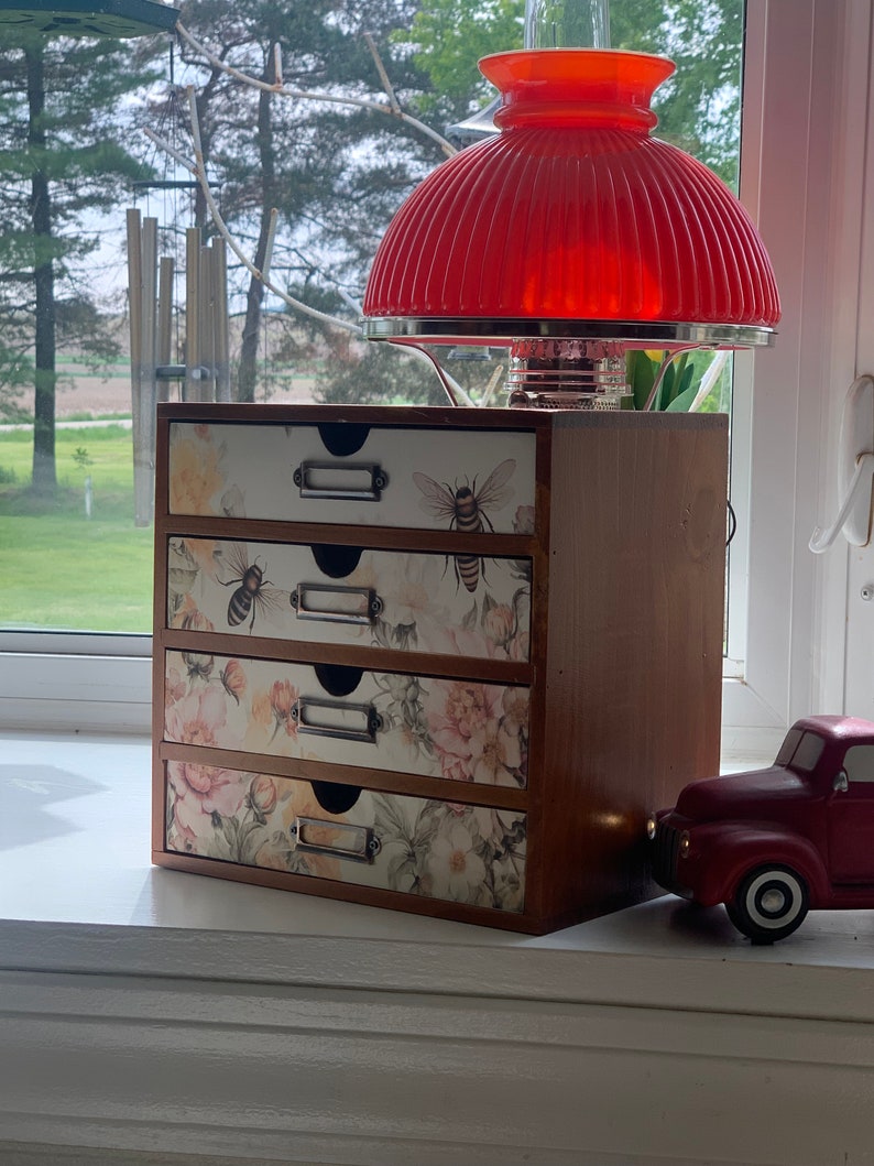 Beautiful wood embroidery floss organizer cabinet holds up to 300 bobbins full of floss