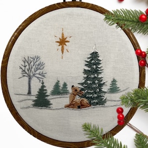 Easy Christmas Deer Embroidery Kit for beginners w/ beautif'ul snowy woods scene & baby fawn. Holiday wall hanging with Peace. Complete kit.