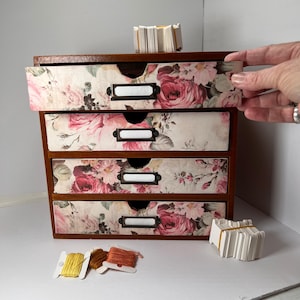 Beautiful wood embroidery floss organizer cabinet holds up to 300 bobbins full of floss