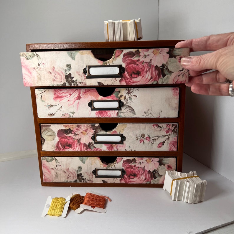 Beautiful wood embroidery floss organizer cabinet holds up to 300 bobbins full of floss