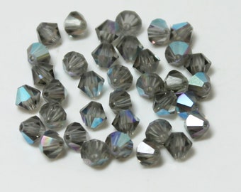 Article 5301 Vintage Swarovski Crystal, 4mm Bicone in Black Diamond AB, Sold by the 3 Dozen