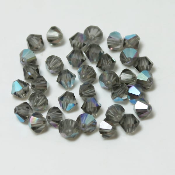 Article 5301 Vintage Swarovski Crystal, 4mm Bicone in Black Diamond AB, Sold by the 3 Dozen
