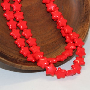 12mm Czech Pressed Glass Star Beads in Opaque Red, Sold by the 25 Pieces