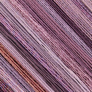 May include: A collection of various shades of purple and brown seed beads arranged in rows. The beads are strung on thin threads and create a textured, diagonal pattern.