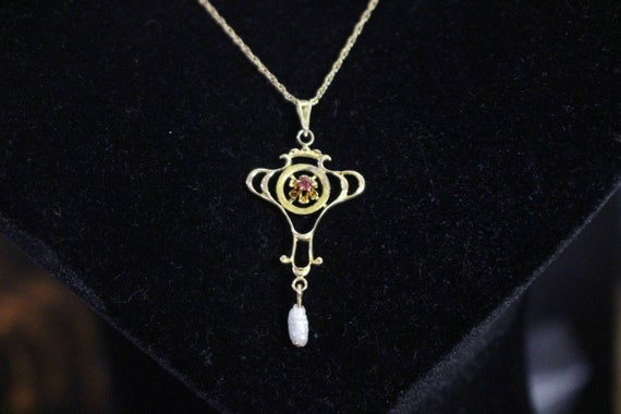 10k gold and ruby art nouveau pendant