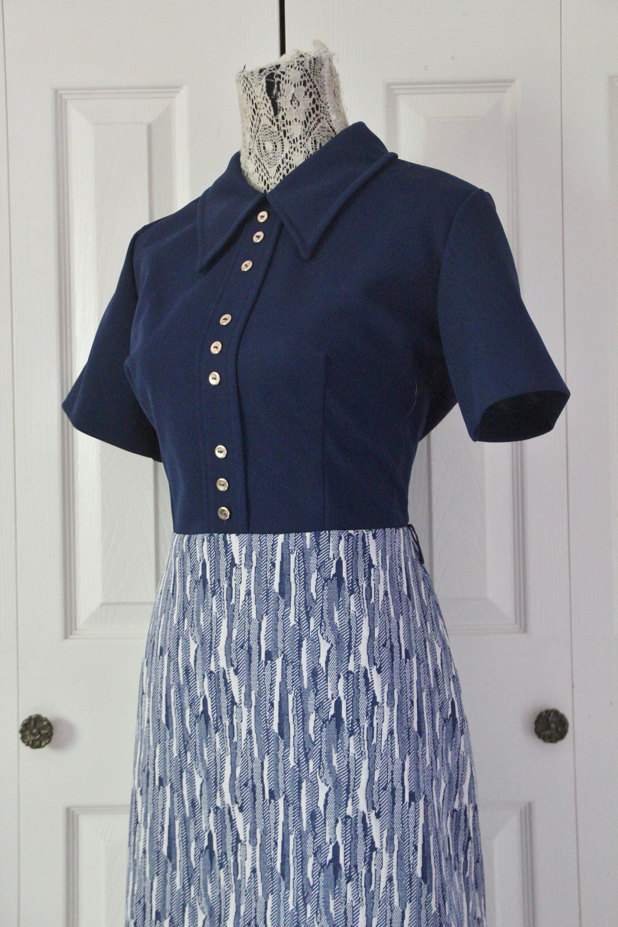 navy and white gown