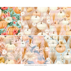 May include: A seamless pattern featuring white, orange, and yellow pumpkins with dried pampas grass, white flowers, and green leaves on a light blue, pink, and peach background.