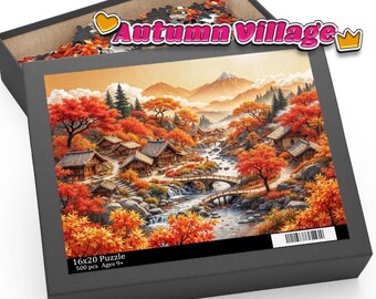 May include: A puzzle box with a vibrant autumn village scene, including a river, bridges, and houses. The box is open, showing some puzzle pieces. The box has the text "Autumn Village" and "16x20 Puzzle 500 pcs Ages 9+". The puzzle measures 40.6 x 50.8 cm.