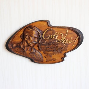 Wall decor Wooden Cossack with the inscription  &quot;Glory to Ukraine&quot; Gift from Ukraine Dimensions 10x17 inches Wooden decoration on wall