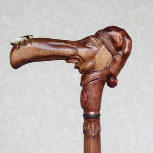 Custom walking cane Man in stocking cap with fly on the nose Hand carved walking stick Wooden cane