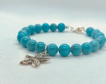 Turquoise howlite beaded bracelet with starfish charm
