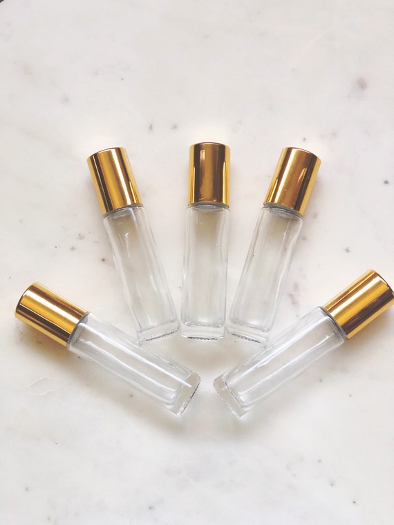 Gold essential oil roller bottle