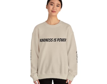 Kasisi6 Creations Unisex Heavy Blend™ Crewneck Sweatshirt with Graphic text  'Kindness is Power'