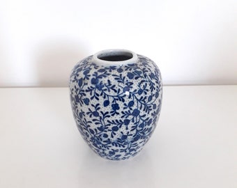 Small old vase in white and blue ceramic / XIX th century.