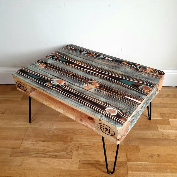 Reclaimed retro pallet coffee table 'evil eye' in urban farmhouse style, made with salvaged wood with industrial hairpin legs