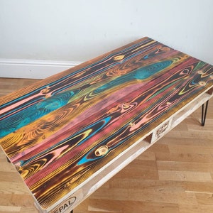 Painted pallet coffee table made with reclaimed wood with industrial hairpin legs