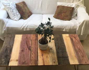 Reclaimed wood pallet coffee table with industrial hairpin legs in farmhouse and rustic style