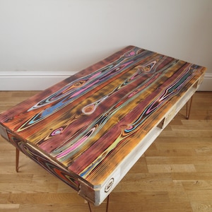 Painted pallet coffee table made with reclaimed wood with industrial hairpin legs