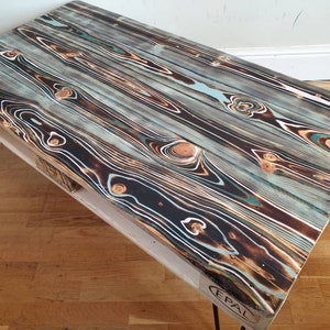 Reclaimed retro pallet coffee table &#39;evil eye&#39; in urban farmhouse style, made with salvaged wood with industrial hairpin legs